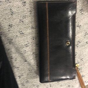 Leather wallet.  Hobo brand. Tan and black
